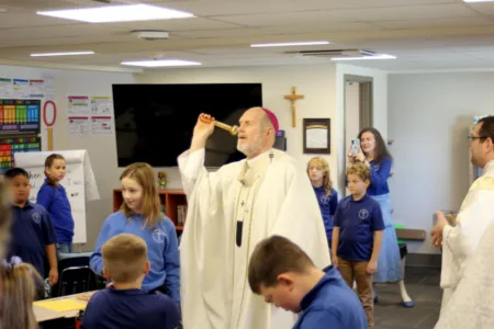 Archbishop, clergy, parishioners count many blessings of St. Thomas Aquinas School